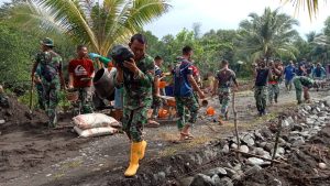 Jalan Akses Produksi Pertanian Diperbaiki Satgas TMMD 116, Warga Desa Tou Tak Takut Hujan Lagi
